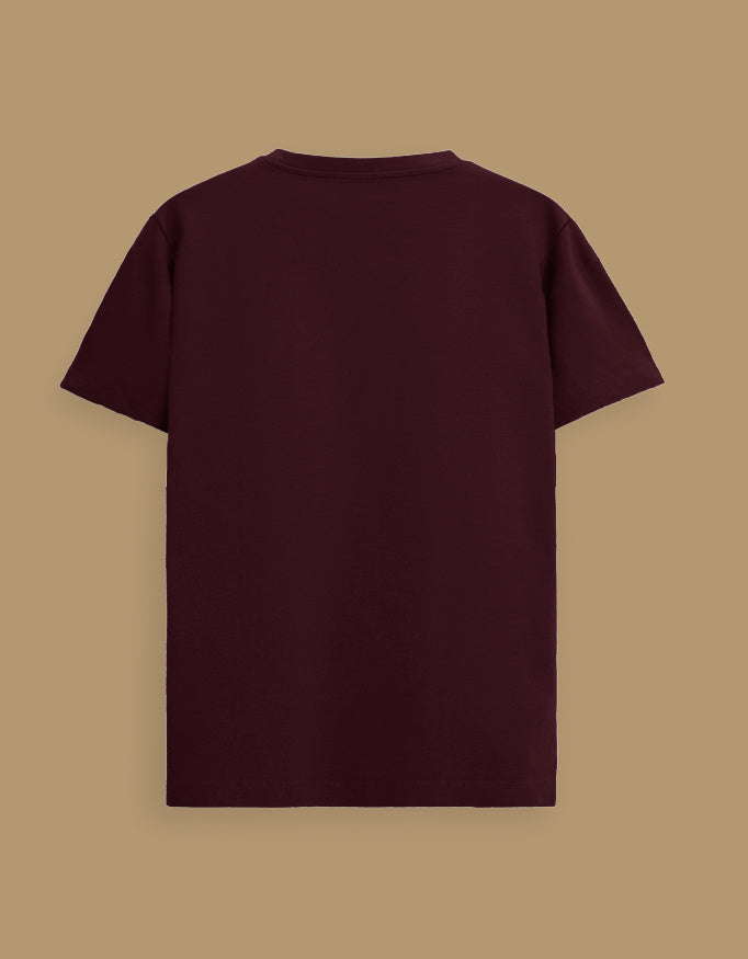 Back view of maroon Unisex Supima T-Shirt, showcasing clean design and premium cotton fabric for travel comfort.