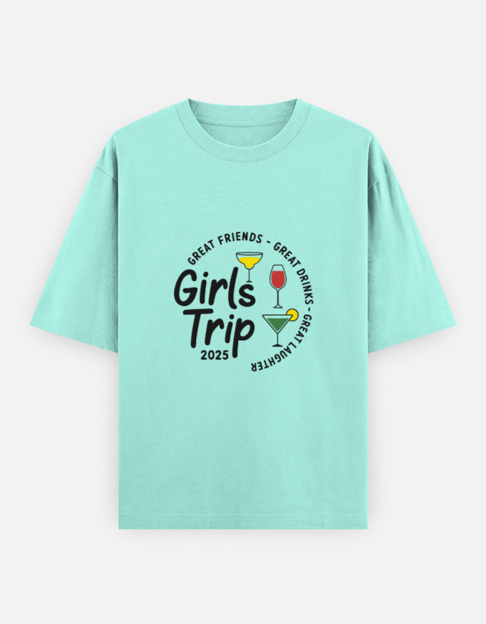 Classic Unisex T-Shirt - Oversized Cotton in mint green with 'Girls Trip 2025' graphic and cocktail icons. Durable 240 GSM cotton for travel comfort.