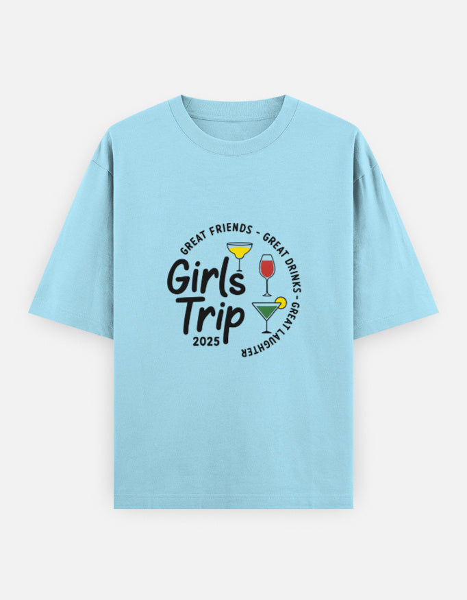 Classic Unisex T-Shirt - Oversized Cotton in light blue with 'Girls Trip 2025' and colorful cocktail graphic. Ideal for fun road trips or girl trips.