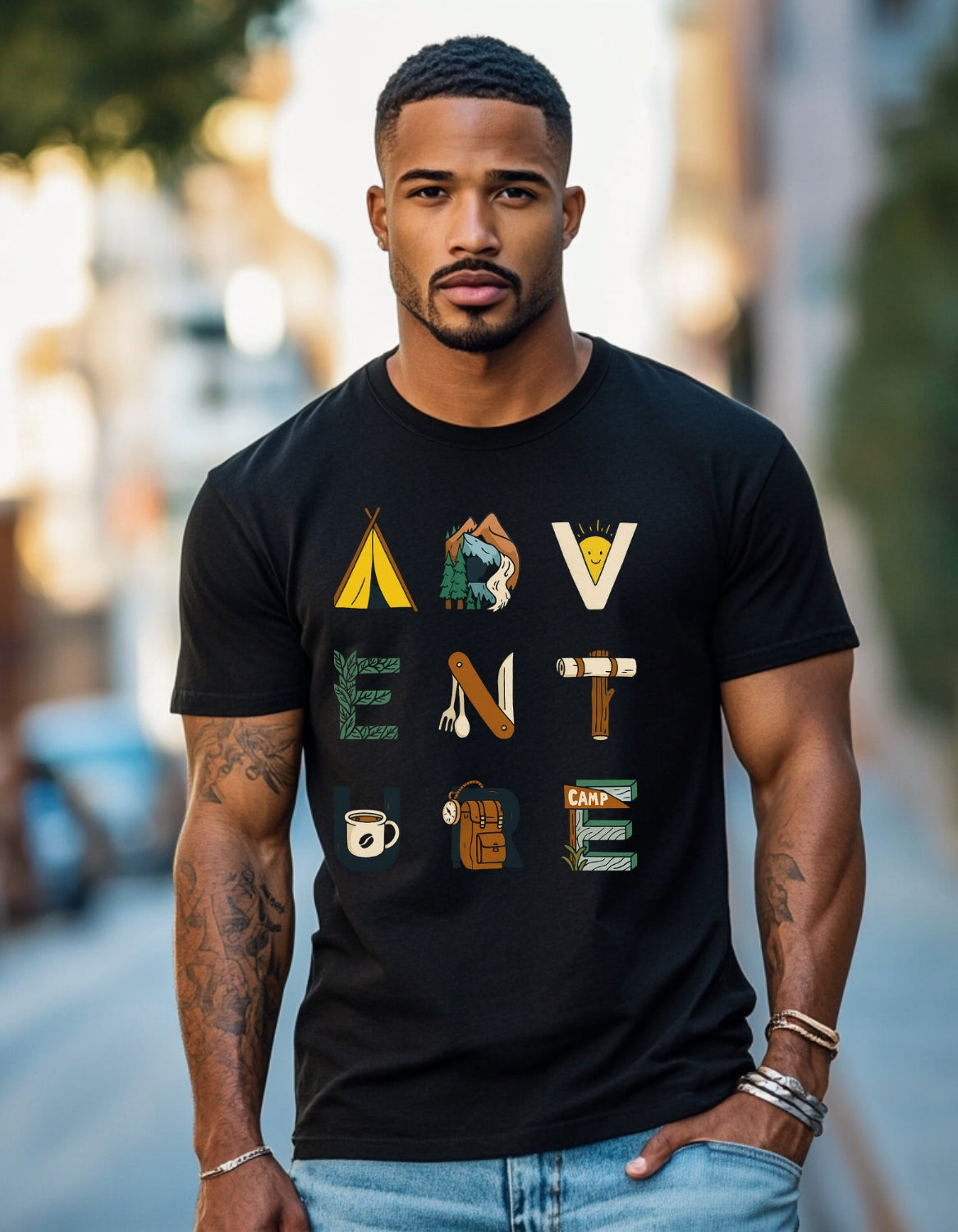 Unisex Terry Oversized Tee - Premium Fit | Cotton Polyester Tee in black with colorful 'ADVENTURE' graphic, worn by male model outdoors.
