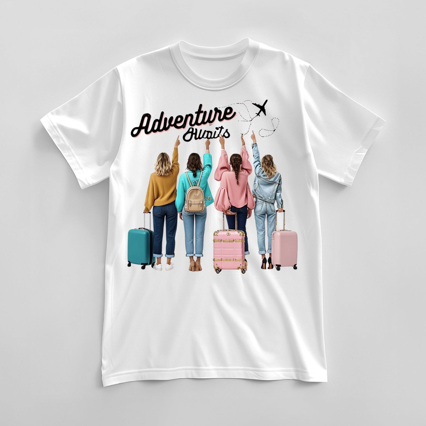 Flat lay of Women's for travel together white t-shirt with vibrant travel illustration and 'Adventure Awaits' slogan, great for gifting.